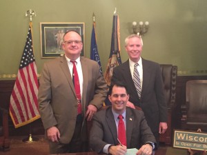 Governor Walker signs AB 568